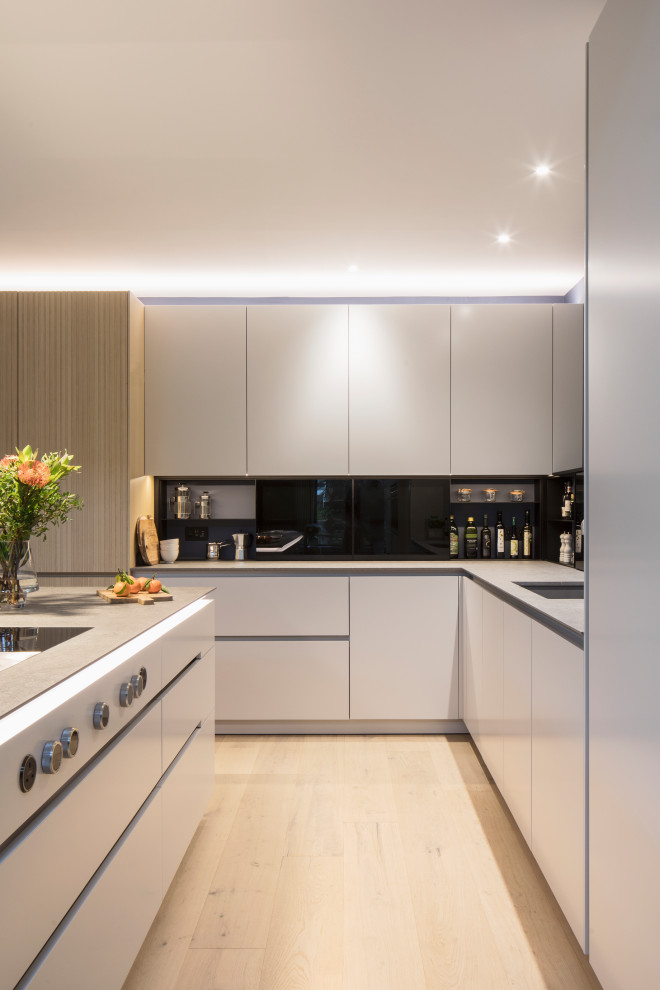 Large contemporary kitchen in Berkshire with quartz benchtops and grey benchtop.