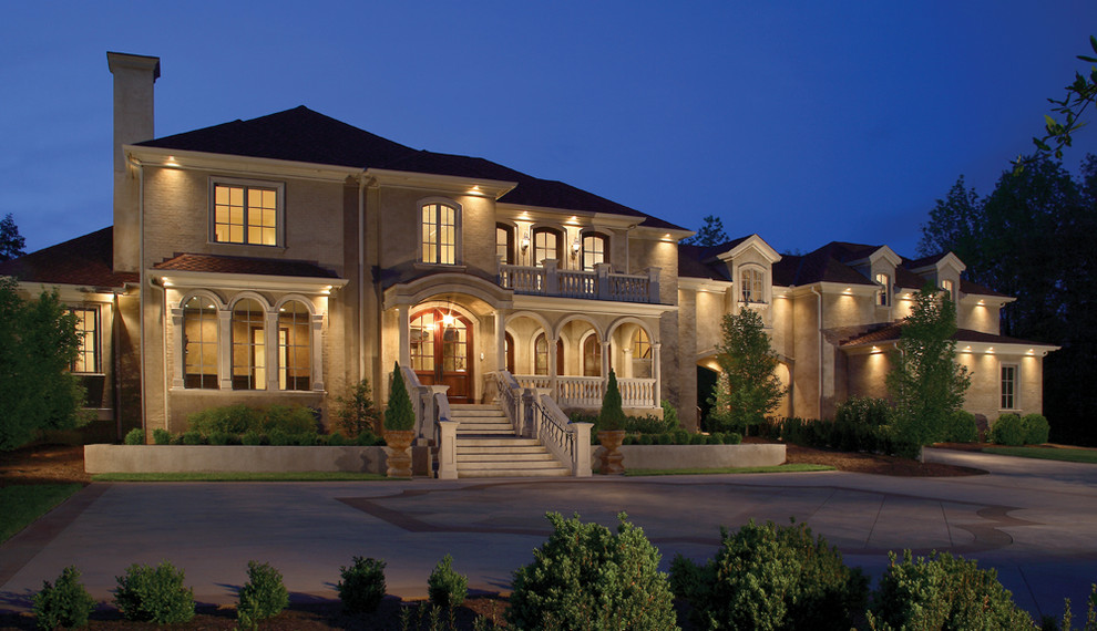Design ideas for a traditional two-storey beige exterior in Nashville.