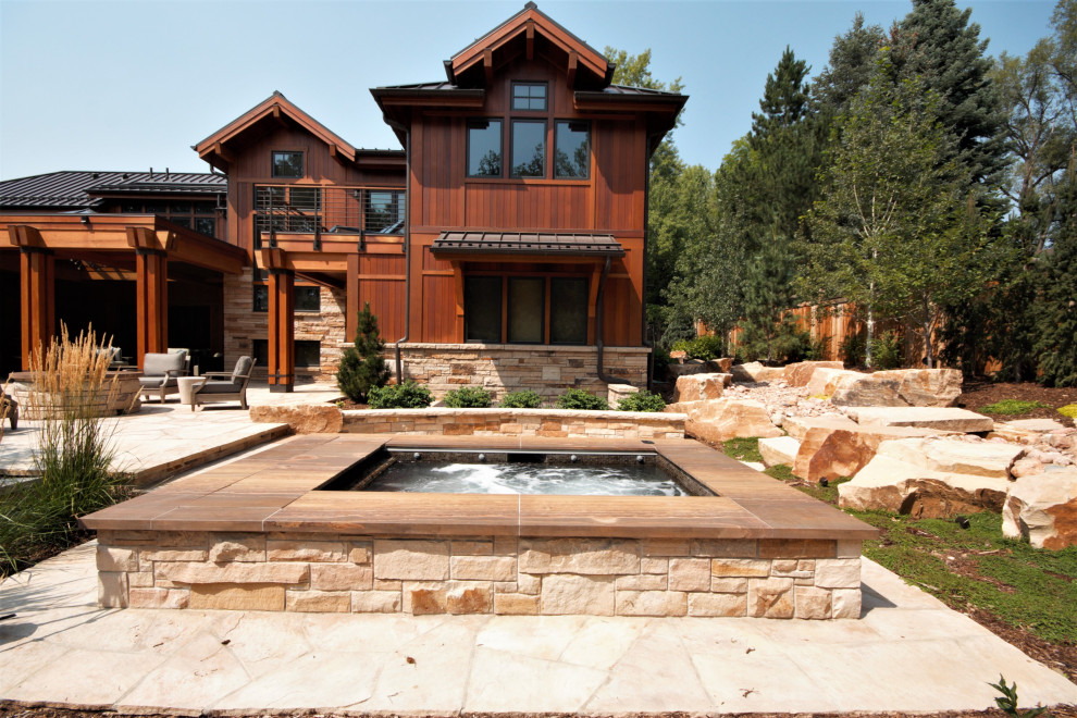 Example of a small backyard rectangular aboveground hot tub design in Denver
