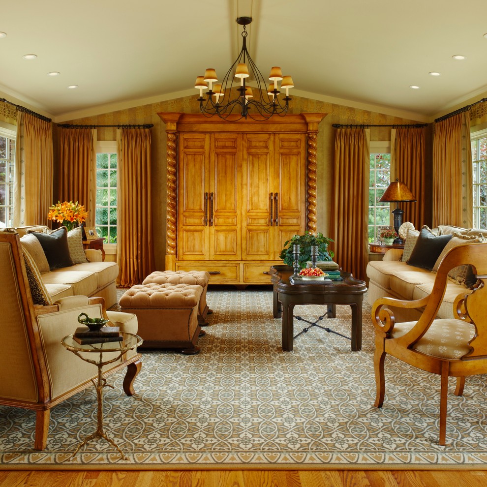 Design ideas for a traditional family room in Detroit with no fireplace and a concealed tv.