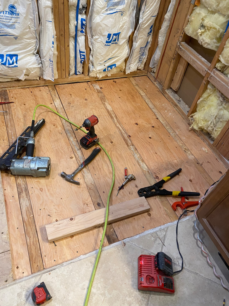 ADA Bathroom/Garage Retrofit and New Flooring