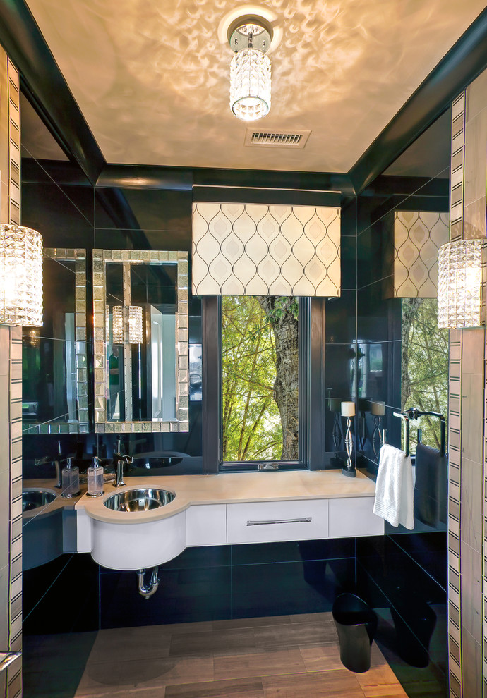 Inspiration for a large contemporary powder room in Charleston with an undermount sink.