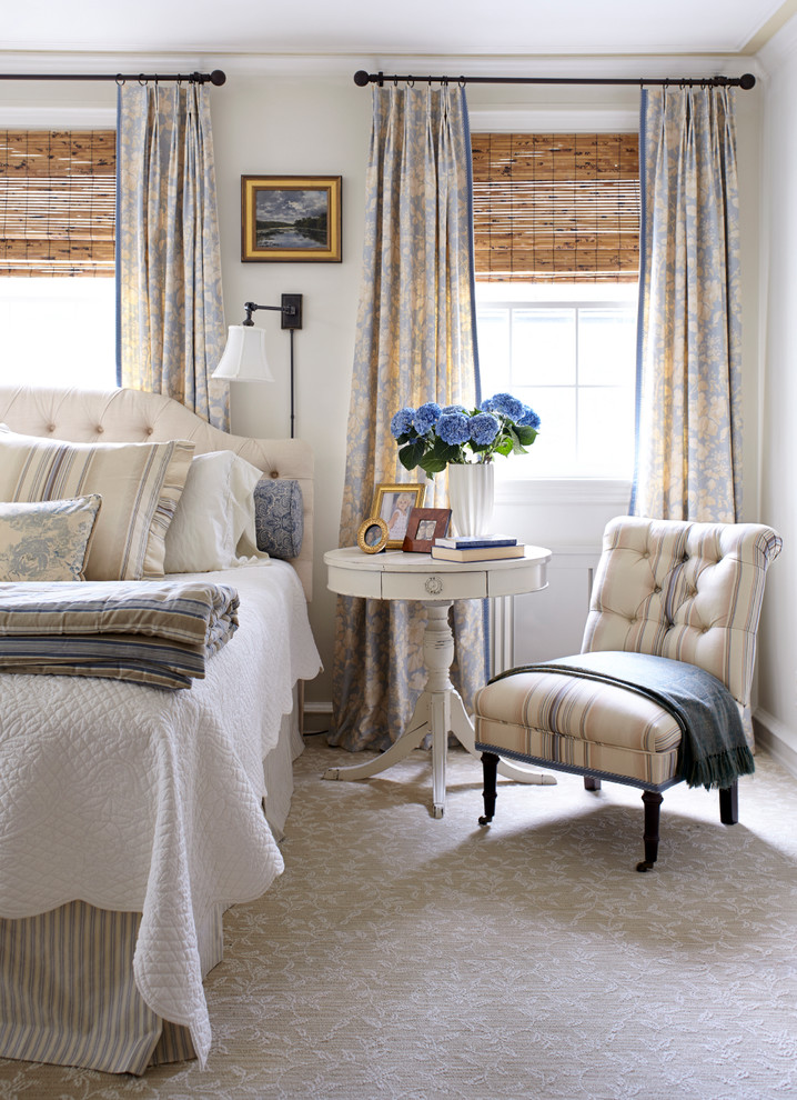 Inspiration for a mid-sized traditional master bedroom in Other with white walls and carpet.