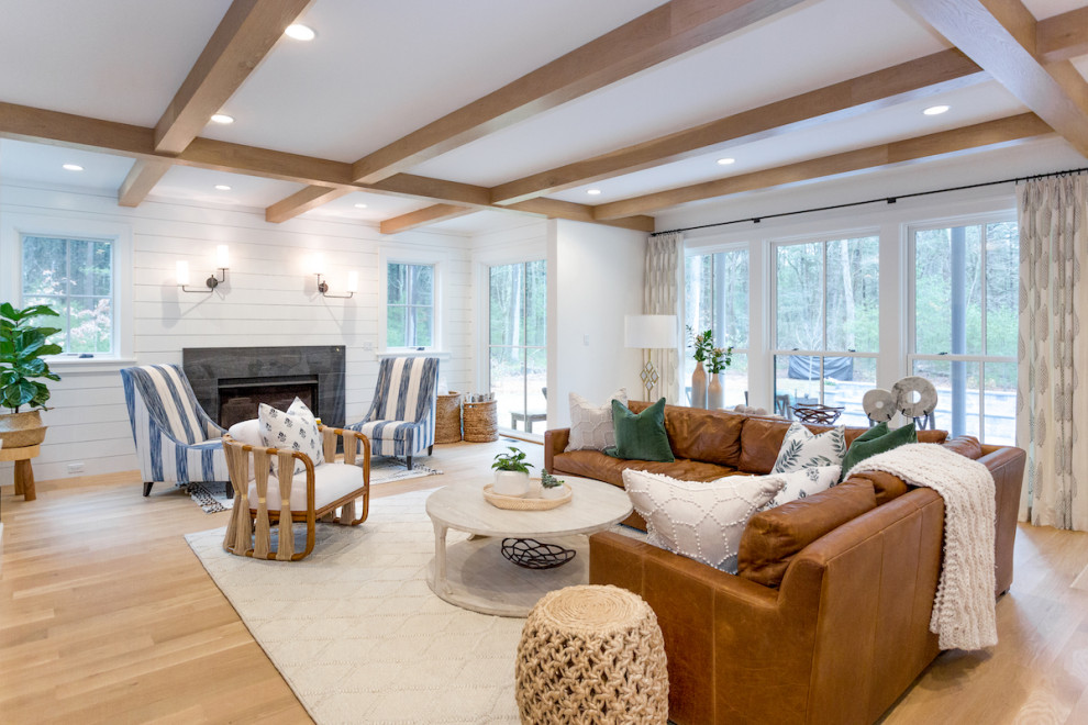 Photo of a country enclosed family room in Boston with medium hardwood floors.