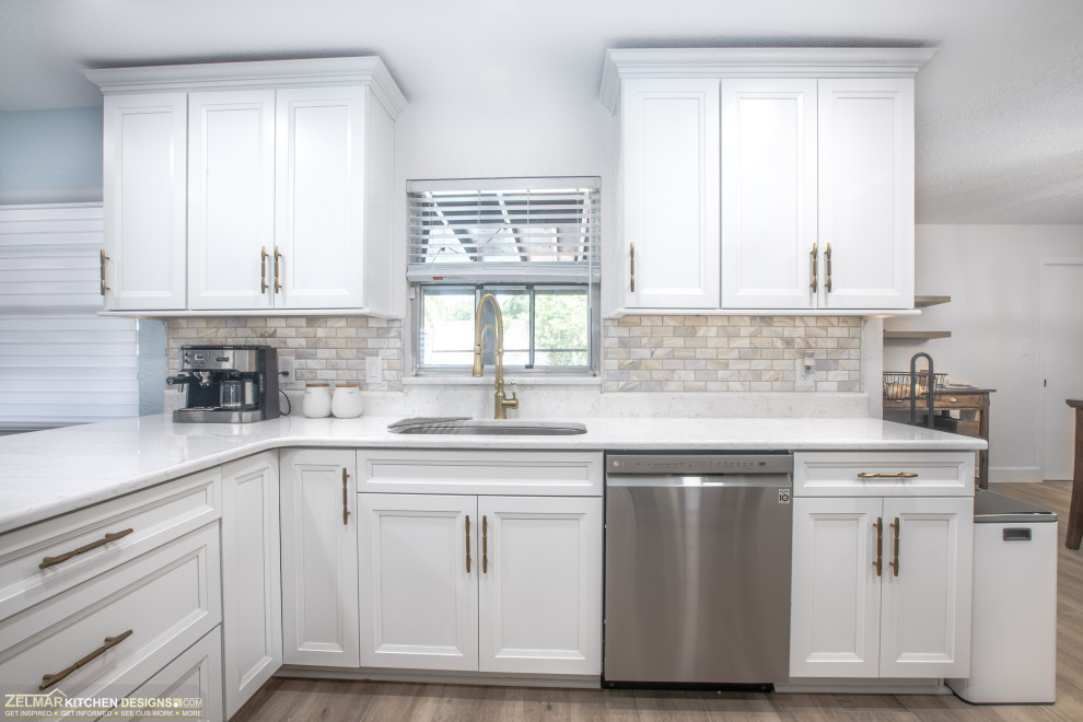 Photo of a mid-sized transitional galley eat-in kitchen in Orlando with recessed-panel cabinets, white cabinets, quartz benchtops, multi-coloured splashback, marble splashback, porcelain floors, no island, beige floor and white benchtop.