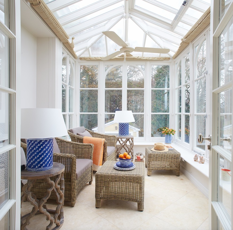 Design ideas for a mid-sized traditional sunroom in Dublin with marble floors and a glass ceiling.