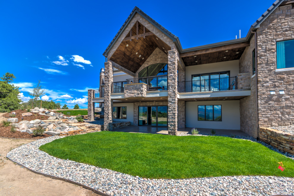 Transitional home design photo in Denver