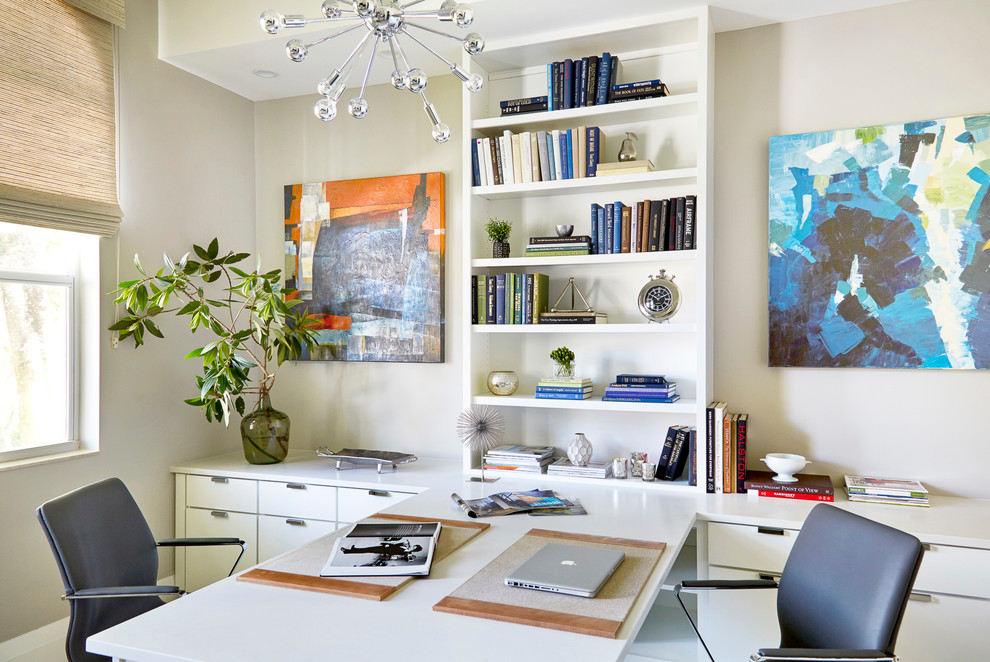 Design ideas for a transitional home office in Miami with grey walls and a built-in desk.