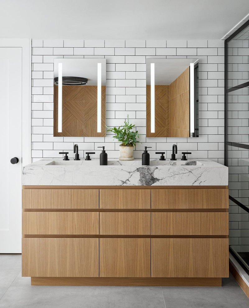 This is an example of a large contemporary master bathroom in Chicago with flat-panel cabinets, light wood cabinets, gray tile, marble, engineered quartz benchtops, white benchtops, a single vanity and a built-in vanity.
