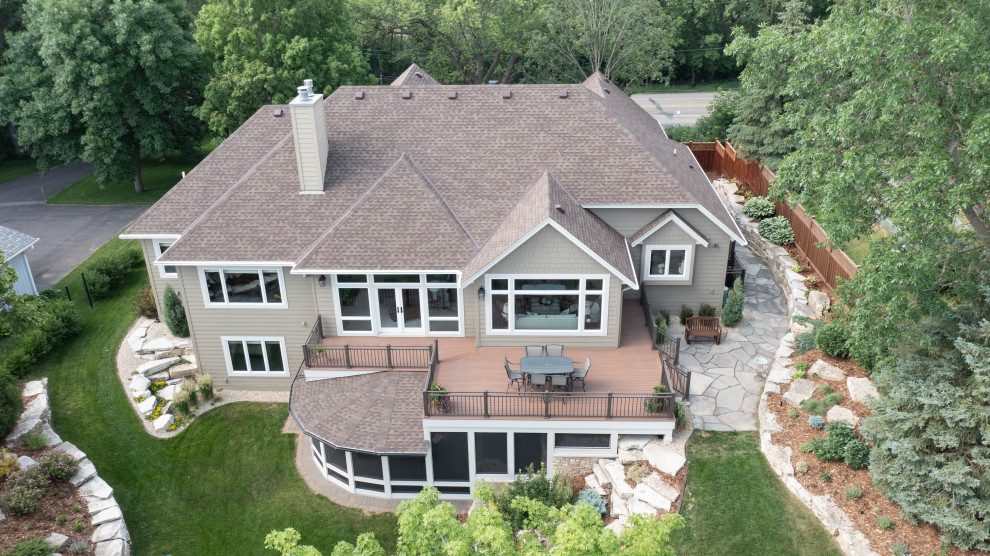 Example of a large mountain style exterior home design in Minneapolis