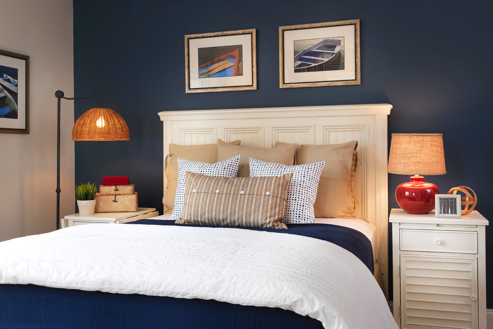 Mid-sized beach style bedroom in Boston with blue walls.