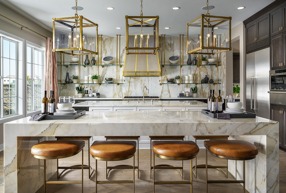 Transitional l-shaped medium tone wood floor and brown floor eat-in kitchen photo in Denver with an undermount sink, recessed-panel cabinets, dark wood cabinets, beige backsplash, stainless steel appliances, two islands and beige countertops