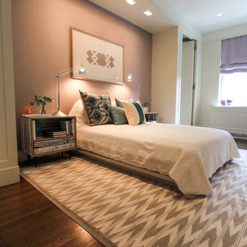 Large transitional guest carpeted bedroom photo in Newark with white walls