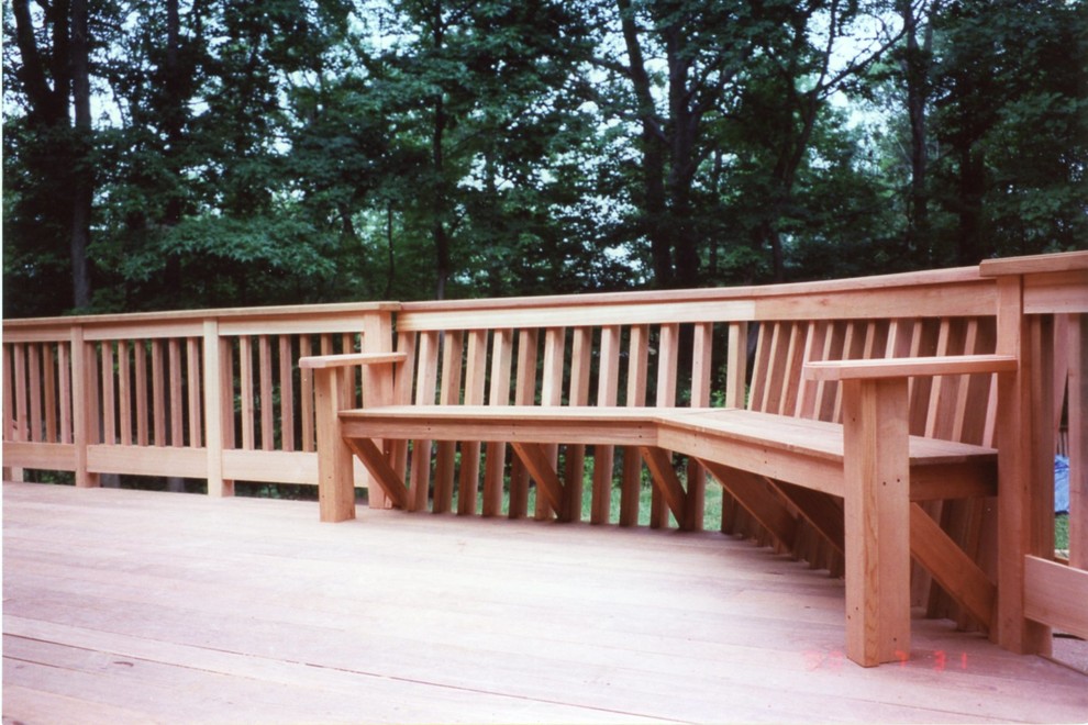 Expansive traditional backyard deck in New York with no cover.