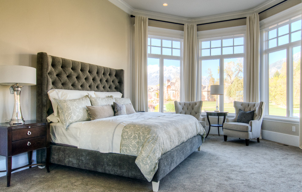 Photo of a large traditional master bedroom in Salt Lake City with grey walls and carpet.