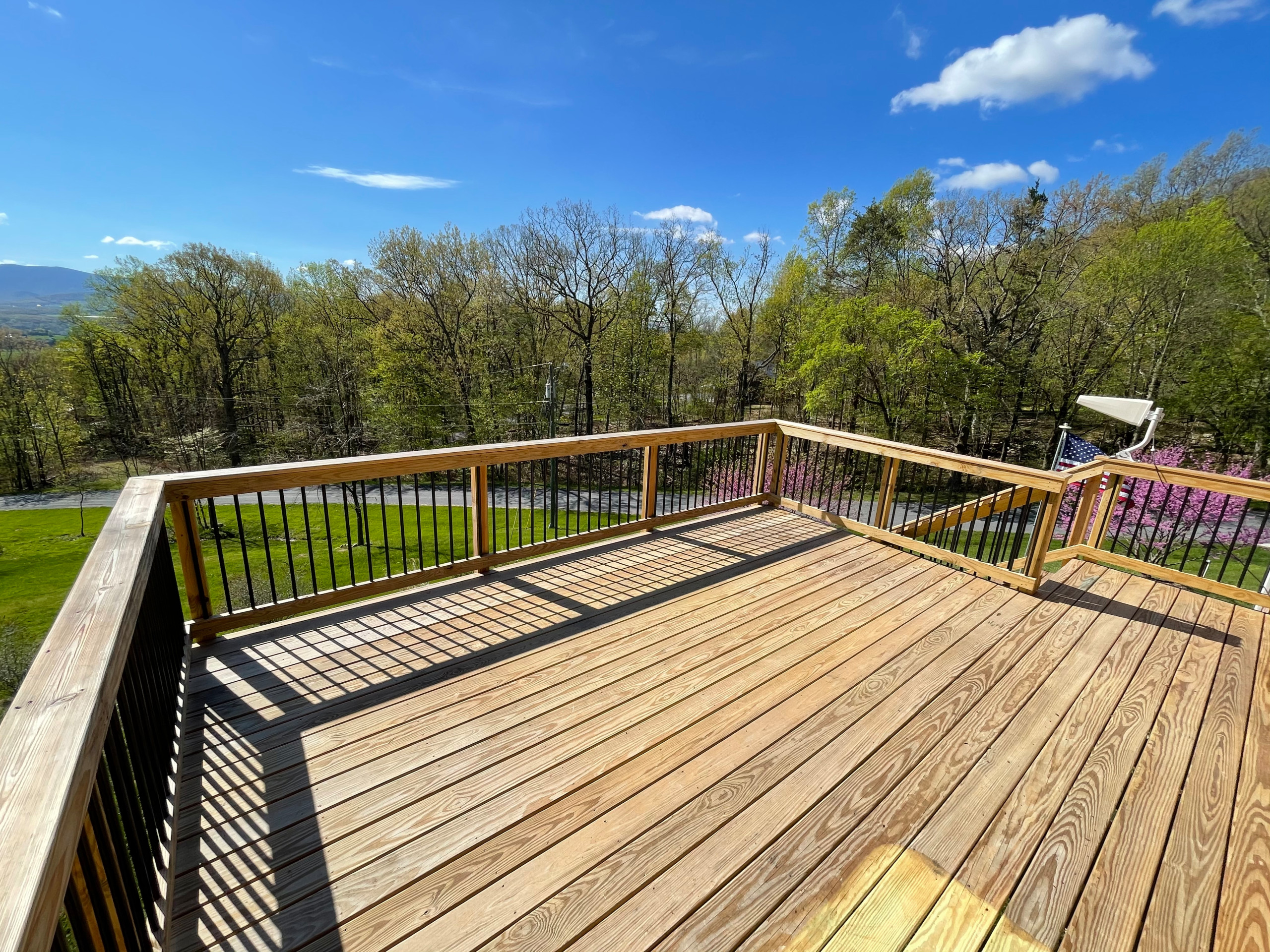 Deck stain and gutters power wash