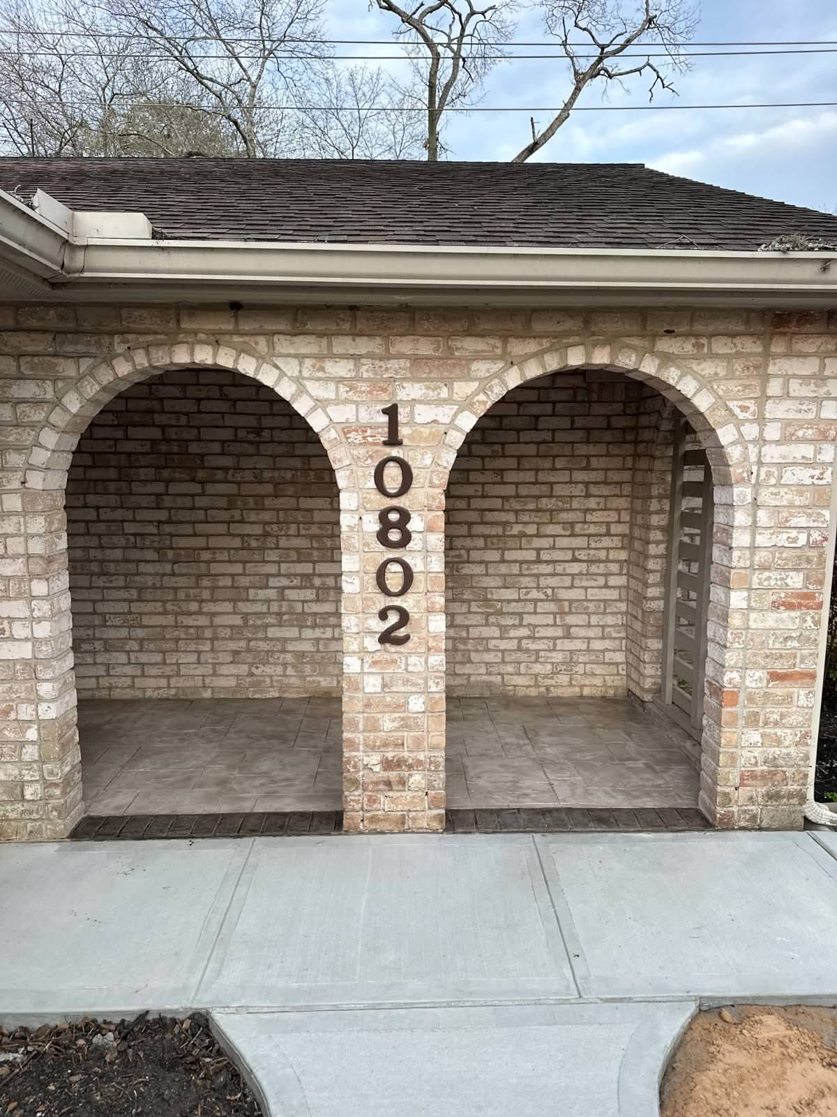 New driveway with sidewalks and stamped concrete!