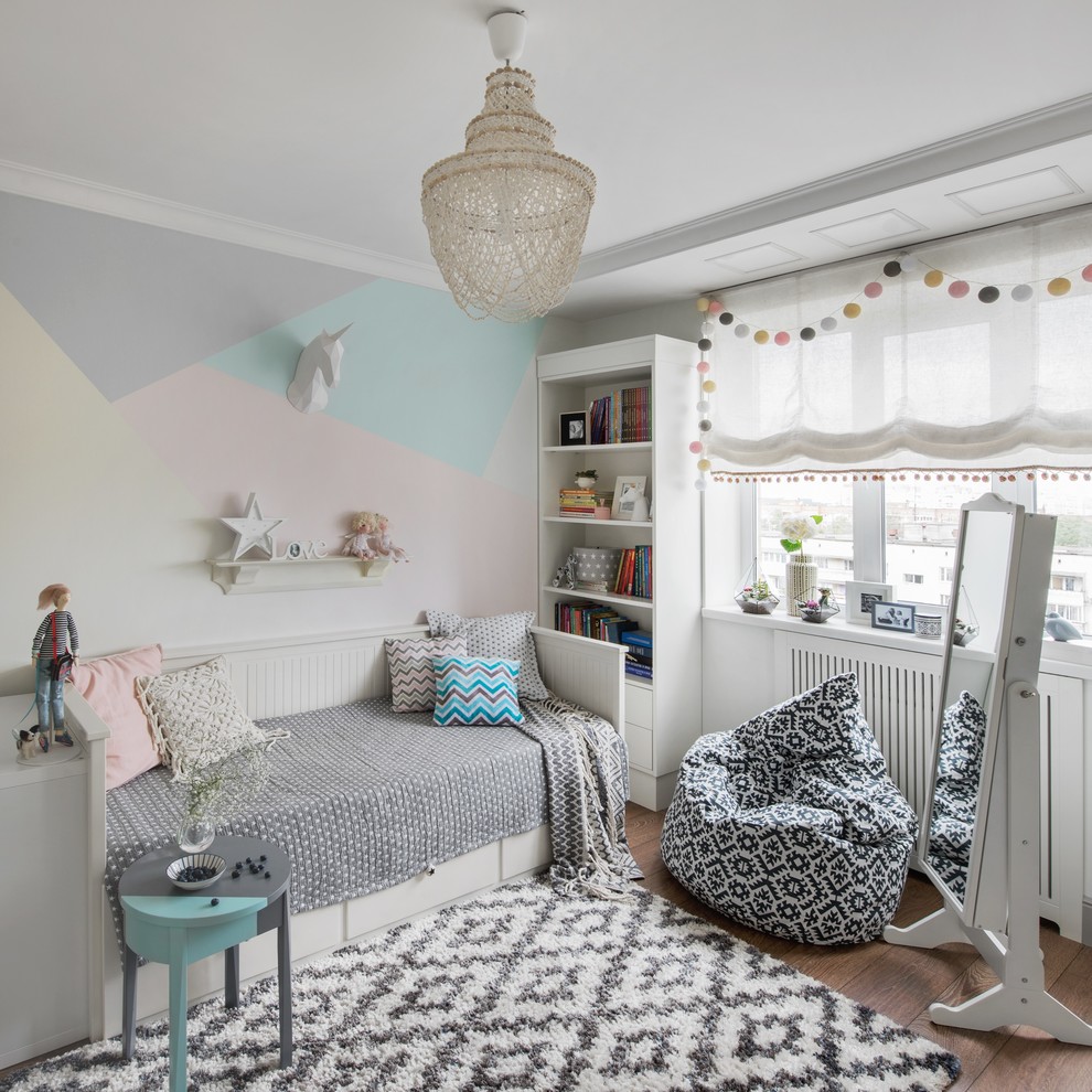 Inspiration for a transitional kids' room for girls in Moscow with multi-coloured walls, brown floor and medium hardwood floors.