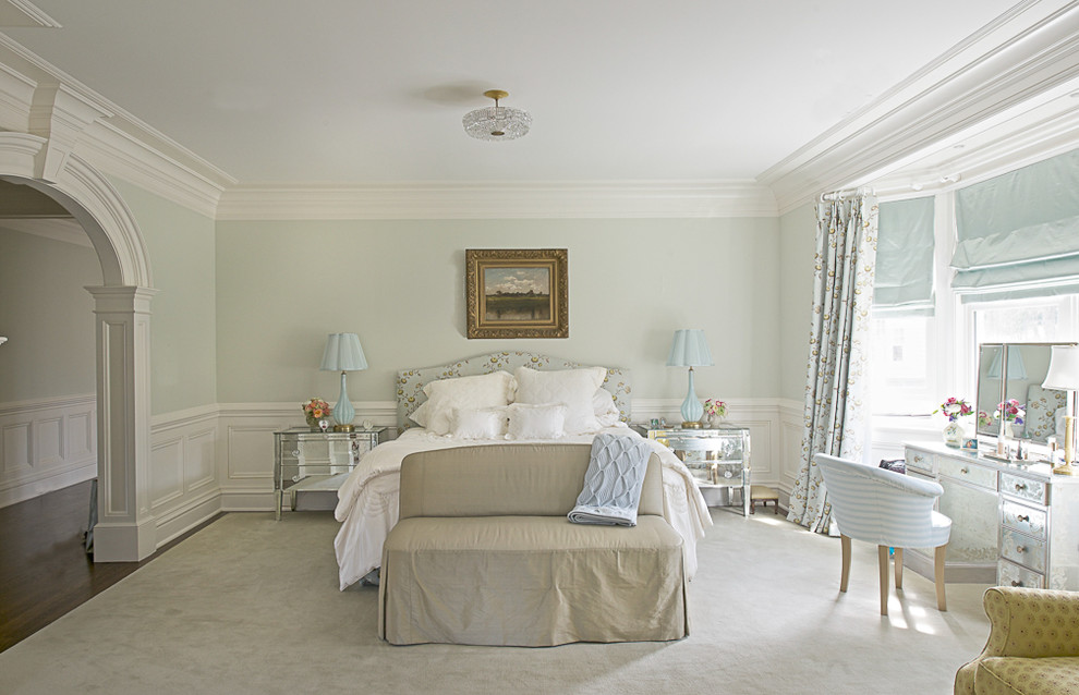 This is an example of a traditional bedroom in New York with grey walls.