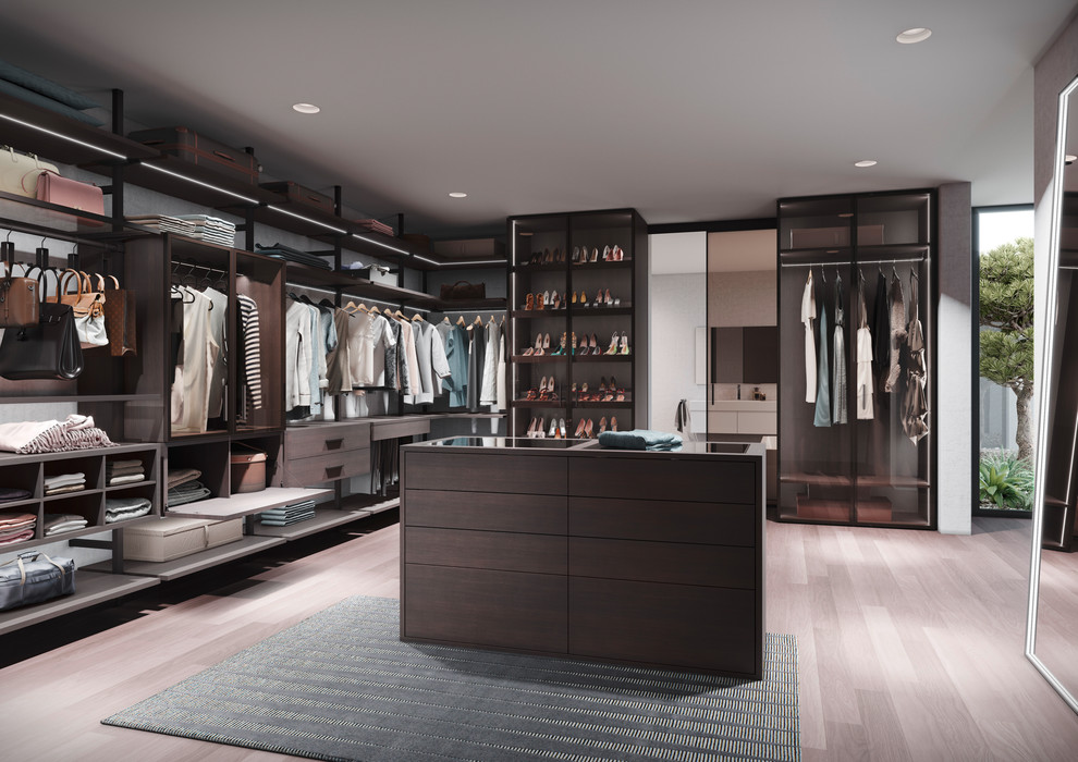 Expansive contemporary gender-neutral walk-in wardrobe in Moscow with open cabinets, laminate floors and grey floor.