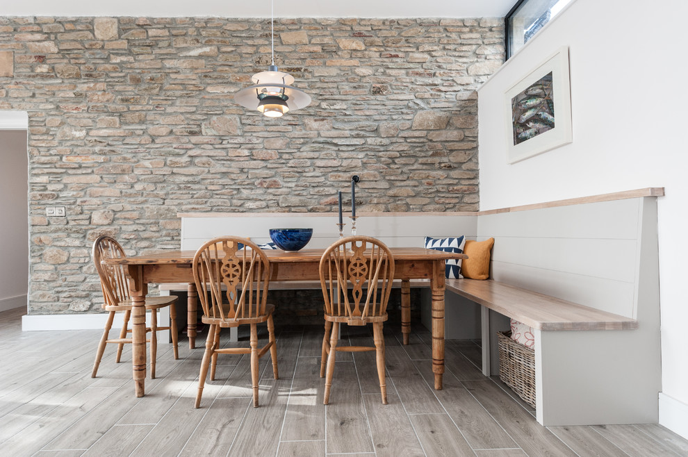 Inspiration for a large beach style kitchen/dining combo in Cork with no fireplace.