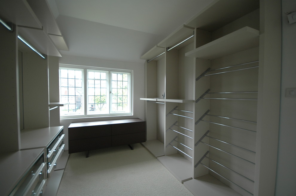 This is an example of a mid-sized contemporary storage and wardrobe in Dorset.