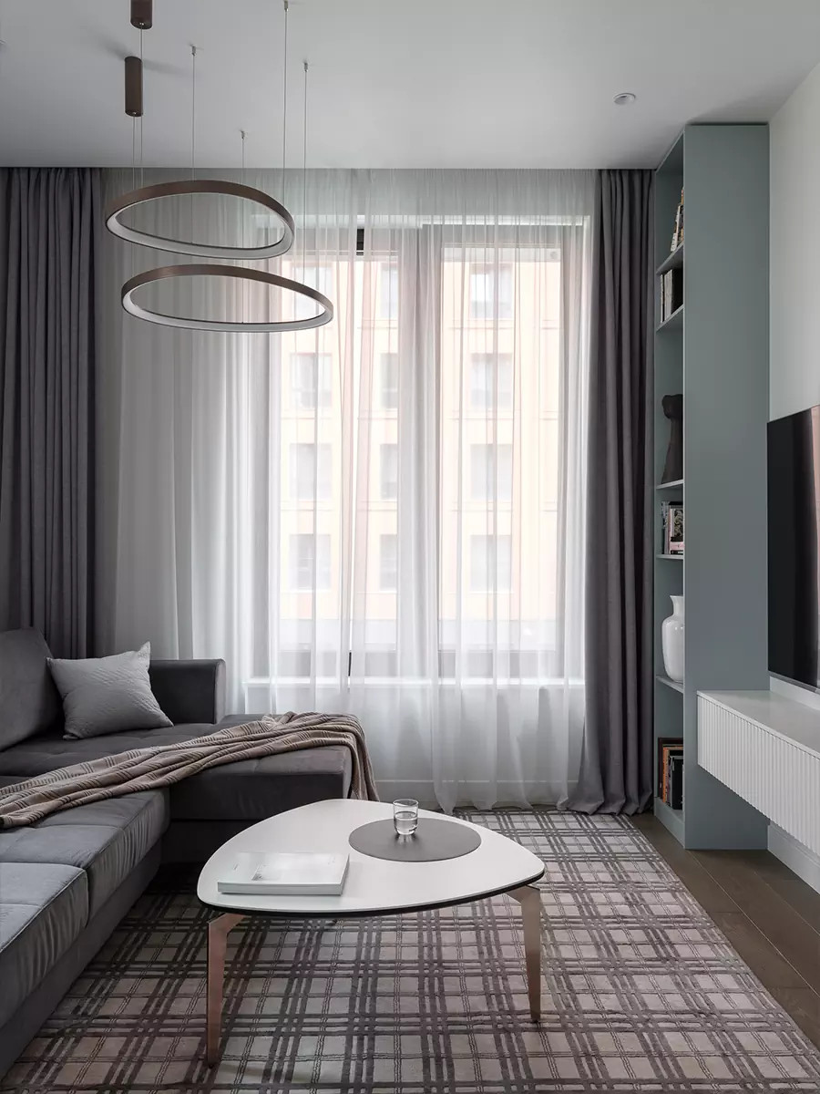 Лаконичный интерьер квартиры с коврами ручной работы