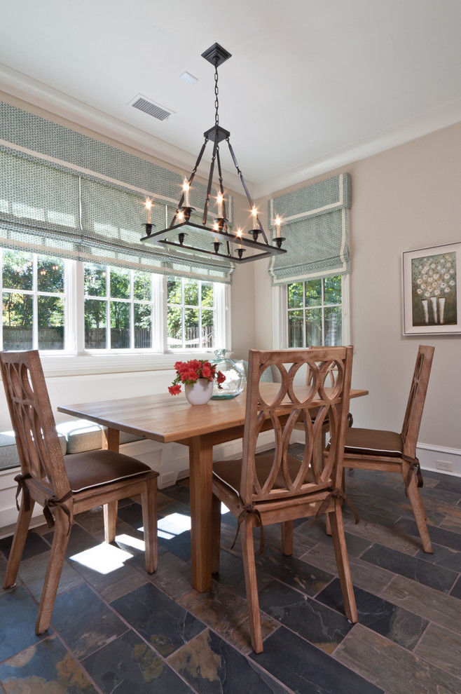 Inspiration for a transitional dining room in Other with grey walls and slate floors.