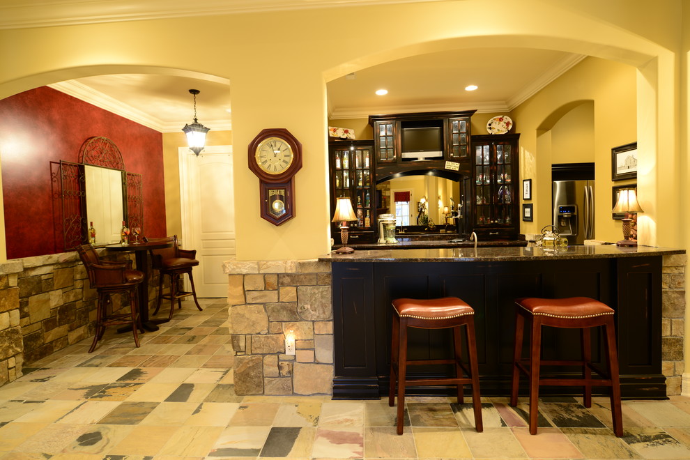 Photo of an expansive arts and crafts home bar in Indianapolis.