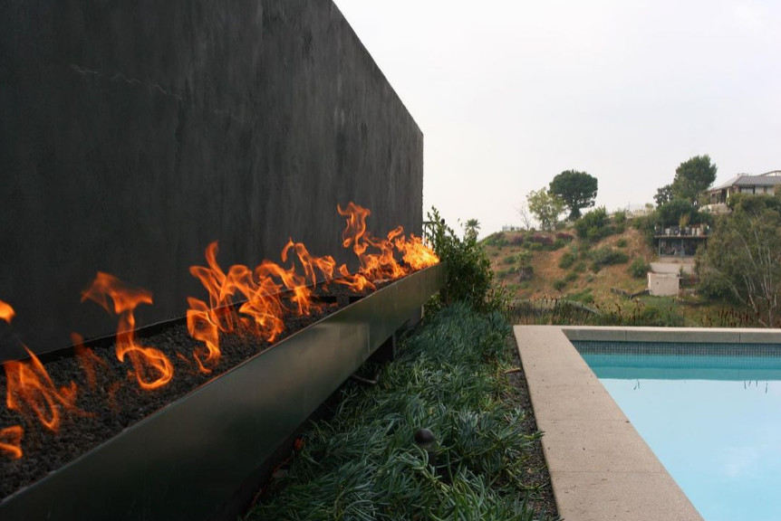 Inspiration for a contemporary pool remodel in Orange County