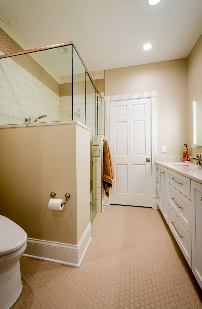 Inspiration for a medium sized classic ensuite bathroom in Chicago with shaker cabinets, white cabinets, an alcove shower, a one-piece toilet, white tiles, white walls, concrete flooring, a built-in sink, engineered stone worktops, white floors, a hinged door, grey worktops, a shower bench, double sinks, a built in vanity unit, a wallpapered ceiling, wallpapered walls, a freestanding bath and ceramic tiles.