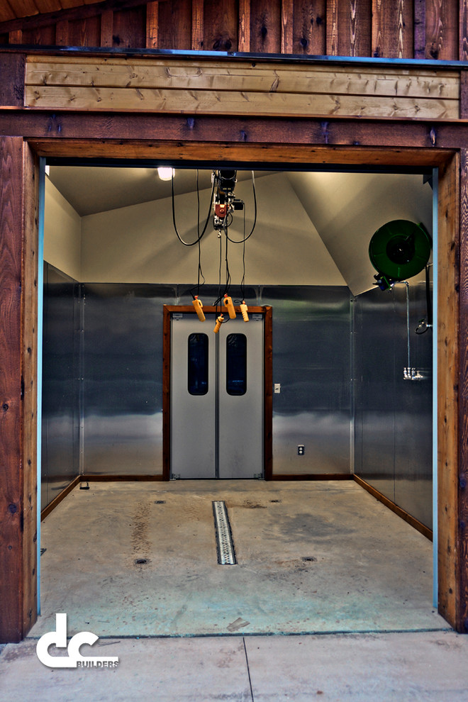 Example of a mid-sized mountain style attached garage design in Atlanta