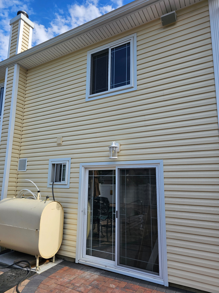 Rear facade, new sliding door and window