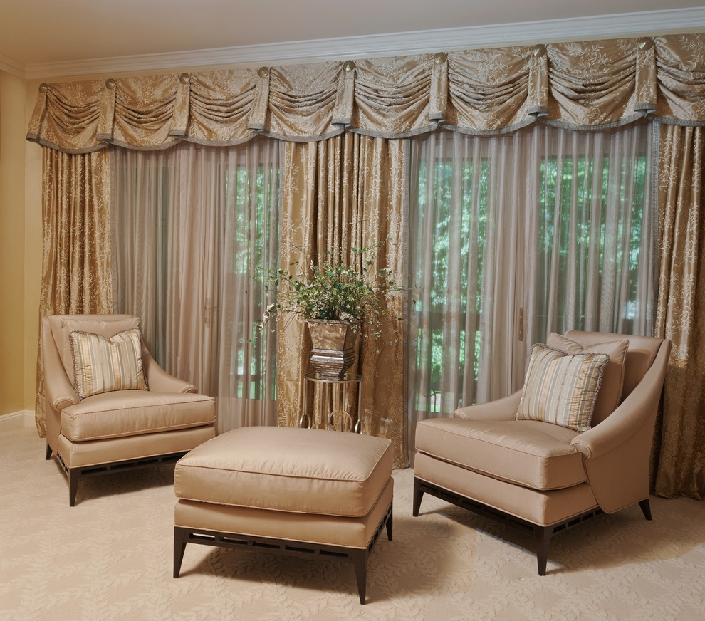 Example of a large transitional master carpeted bedroom design in New York with beige walls