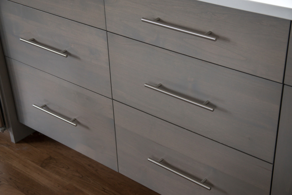 Example of a transitional kitchen design in Denver