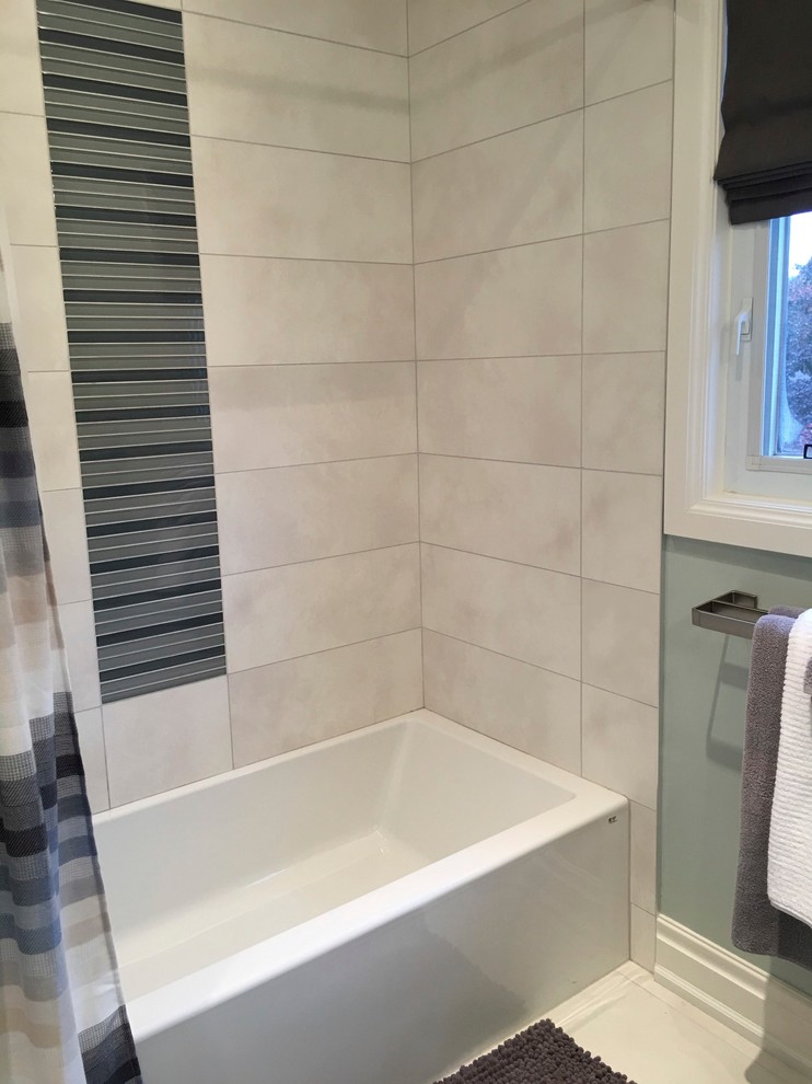 Example of a mid-sized transitional kids' gray tile and porcelain tile porcelain tile double shower design in Toronto with shaker cabinets, dark wood cabinets, gray walls, an undermount sink and quartz countertops
