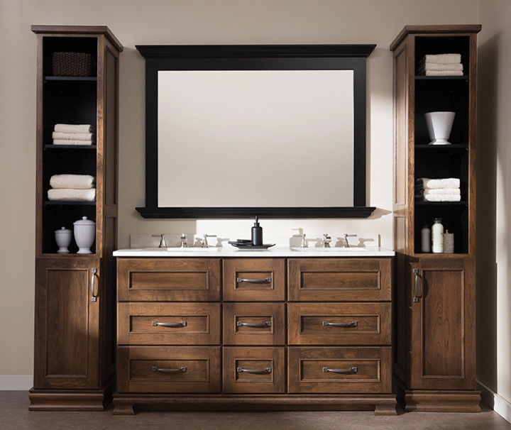 Design ideas for a large traditional master bathroom in New York with recessed-panel cabinets, dark wood cabinets, beige walls, concrete floors, an undermount sink, solid surface benchtops and brown floor.