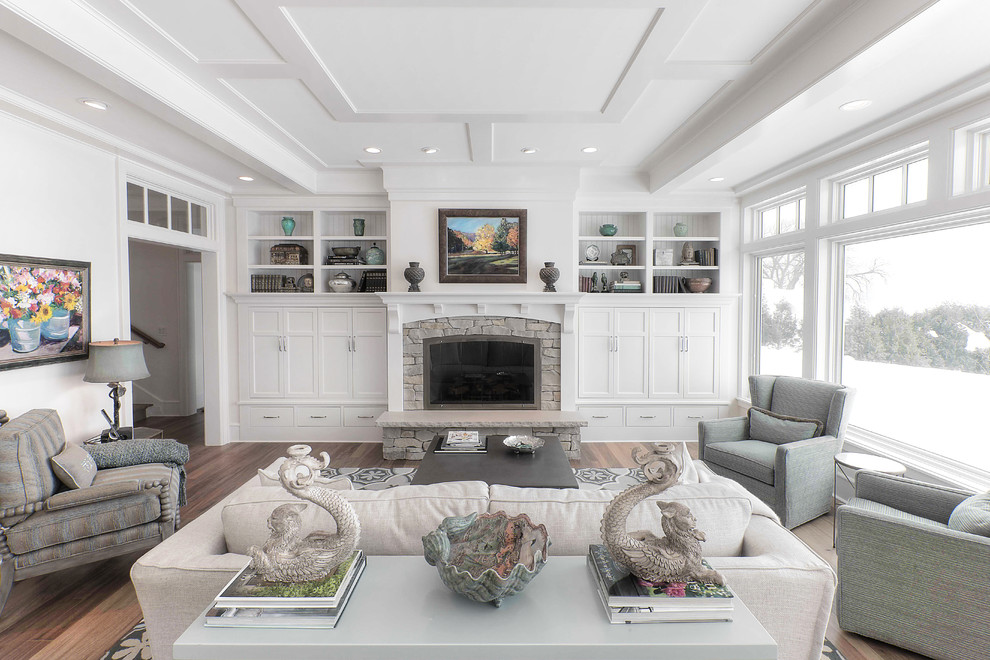 Beach style living room in Other with white walls, a standard fireplace and a stone fireplace surround.