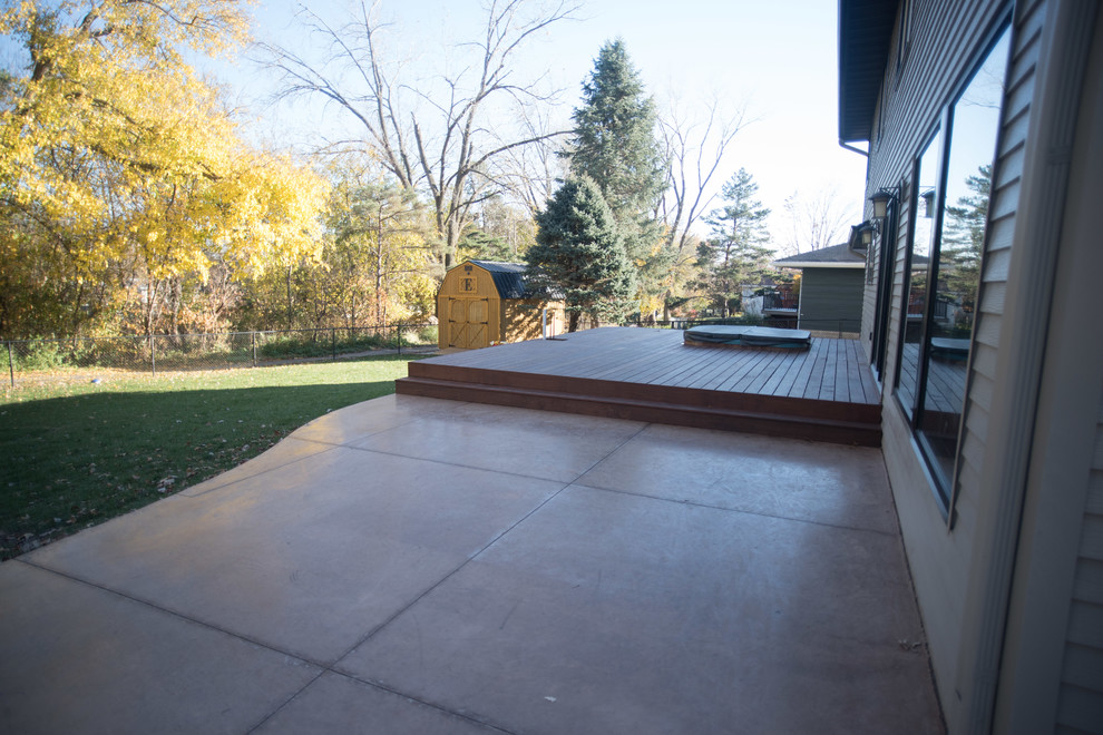 This is an example of a mid-sized contemporary backyard deck in Other.