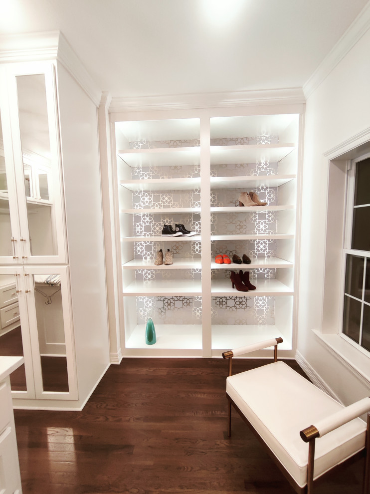 Design ideas for a mid-sized transitional women's dressing room in Little Rock with medium hardwood floors.