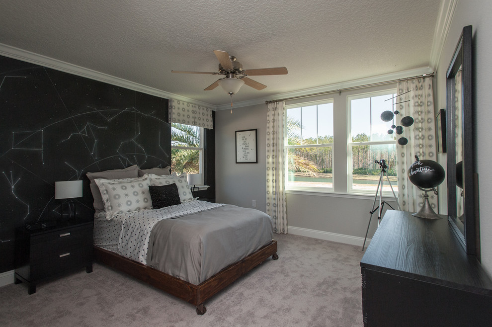 Large transitional guest bedroom in Jacksonville with black walls, carpet and no fireplace.