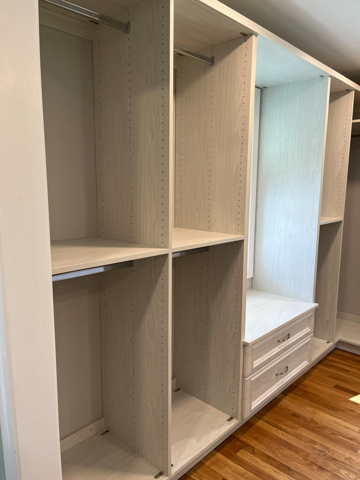 Inspiration for a medium sized contemporary walk-in wardrobe in Boston with shaker cabinets.