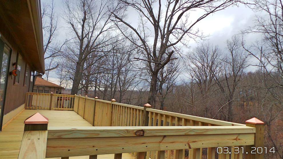 Deck - mid-sized backyard deck idea with decking and no cover