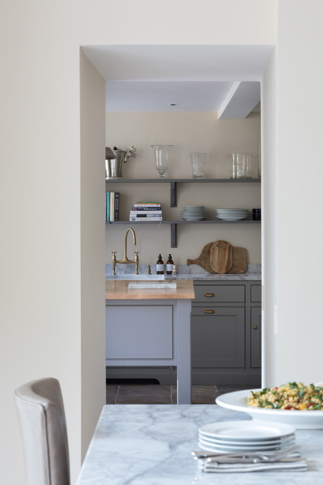 This is an example of a mid-sized transitional kitchen in Oxfordshire.