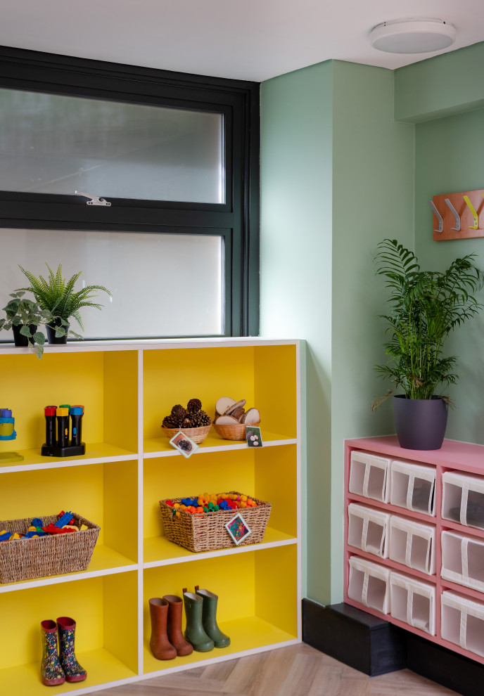 This is an example of a large contemporary kids' bedroom in London.