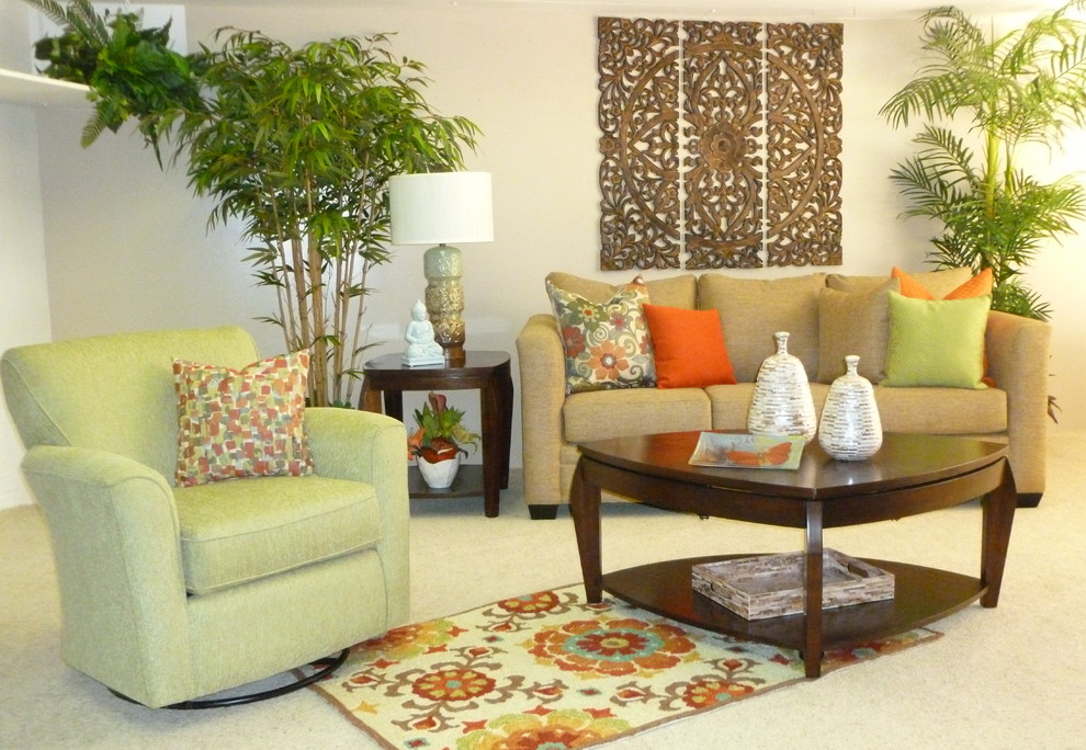 Photo of a mid-sized tropical living room in Hawaii with beige floor, carpet and no fireplace.