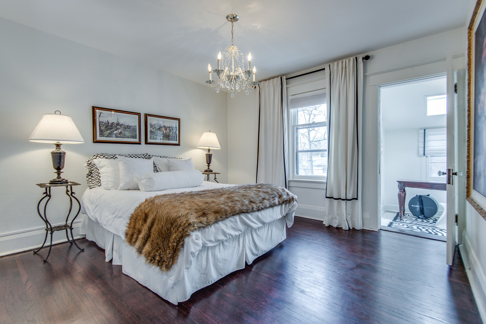 Photo of a large country master bedroom in Toronto with white walls and dark hardwood floors.