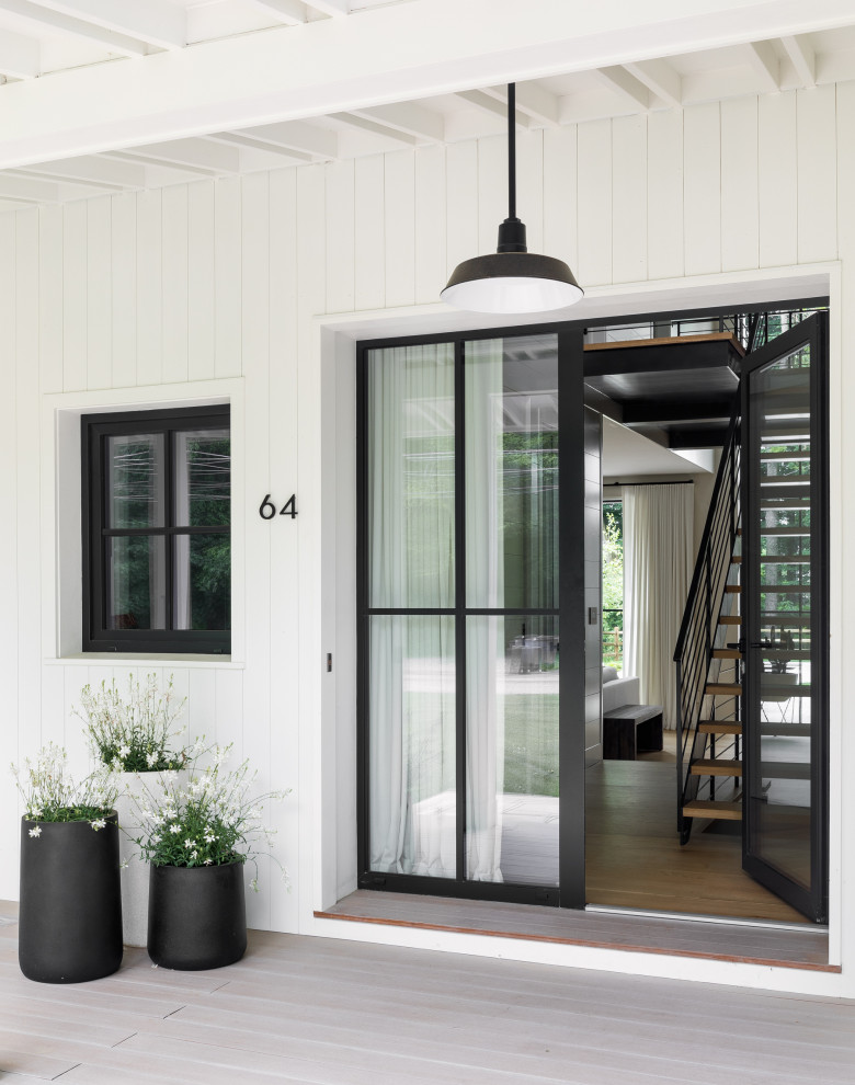 This is an example of a contemporary porch design in New York.