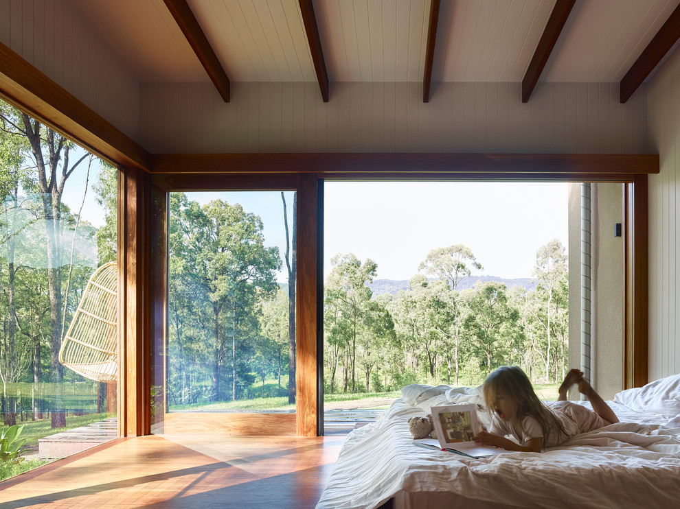 Design ideas for a contemporary master bedroom in Brisbane.