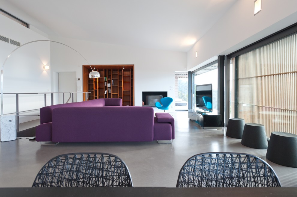 This is an example of a contemporary family room in Corsica.